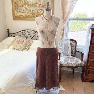 Y2K express brown geometric print midi skirt fits like a size small